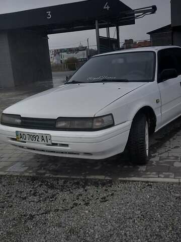 Белый Мазда 626, объемом двигателя 2 л и пробегом 323 тыс. км за 900 $, фото 1 на Automoto.ua