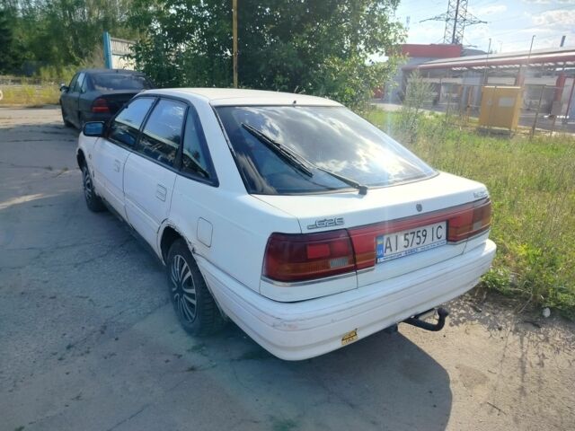 Білий Мазда 626, об'ємом двигуна 2 л та пробігом 300 тис. км за 560 $, фото 5 на Automoto.ua