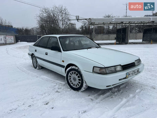 Белый Мазда 626, объемом двигателя 2 л и пробегом 330 тыс. км за 1500 $, фото 1 на Automoto.ua