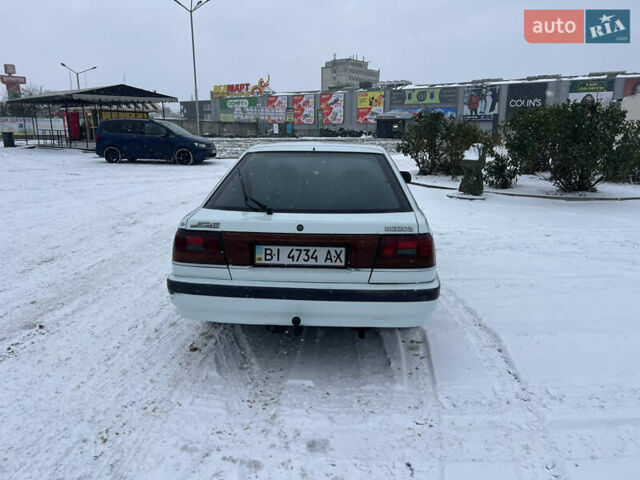 Белый Мазда 626, объемом двигателя 2 л и пробегом 330 тыс. км за 1500 $, фото 4 на Automoto.ua