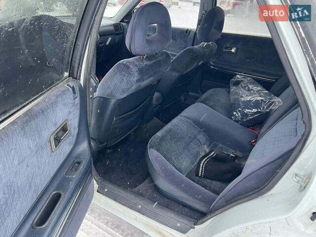 Белый Мазда 626, объемом двигателя 2 л и пробегом 330 тыс. км за 1500 $, фото 10 на Automoto.ua