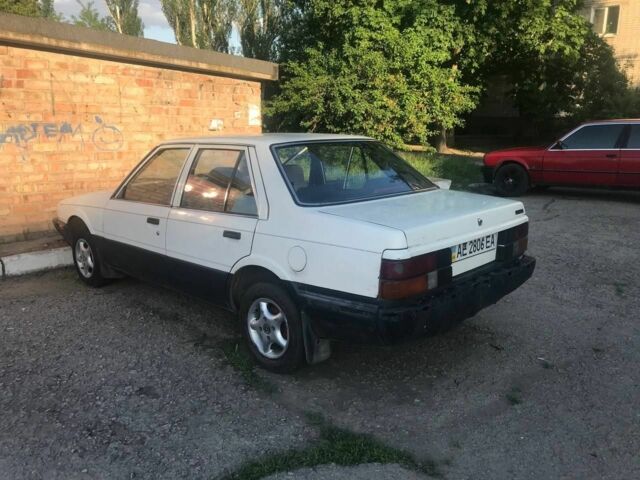 Белый Мазда 626, объемом двигателя 0 л и пробегом 100 тыс. км за 1400 $, фото 1 на Automoto.ua