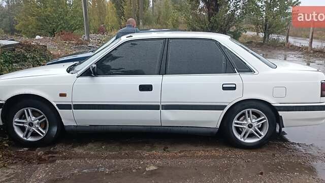 Білий Мазда 626, об'ємом двигуна 2.18 л та пробігом 300 тис. км за 1100 $, фото 2 на Automoto.ua