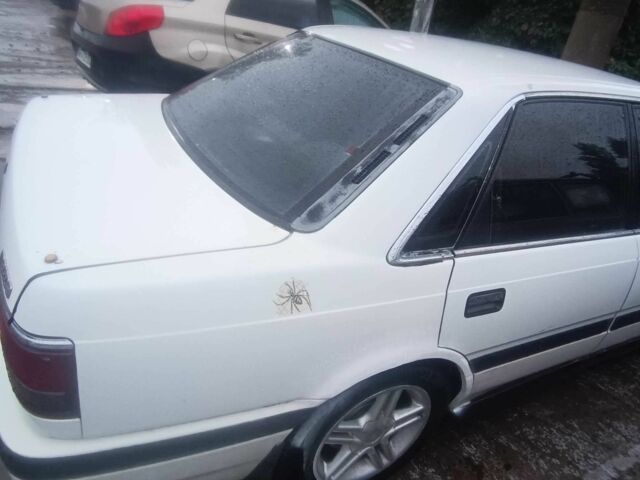 Білий Мазда 626, об'ємом двигуна 2.2 л та пробігом 310 тис. км за 1100 $, фото 4 на Automoto.ua