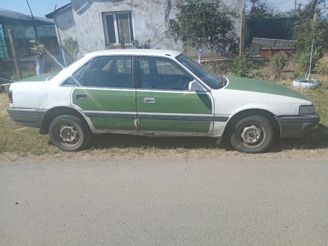 Белый Мазда 626, объемом двигателя 2 л и пробегом 3 тыс. км за 800 $, фото 3 на Automoto.ua
