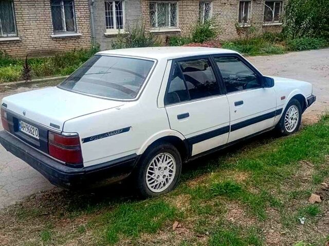 Білий Мазда 626, об'ємом двигуна 2 л та пробігом 300 тис. км за 450 $, фото 1 на Automoto.ua