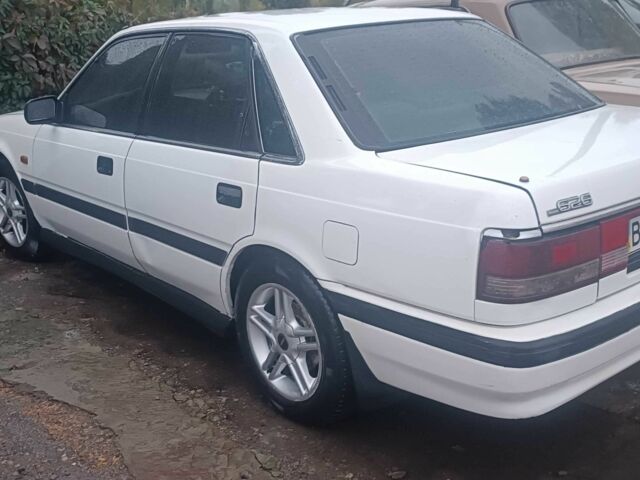 Білий Мазда 626, об'ємом двигуна 2.2 л та пробігом 310 тис. км за 1100 $, фото 3 на Automoto.ua