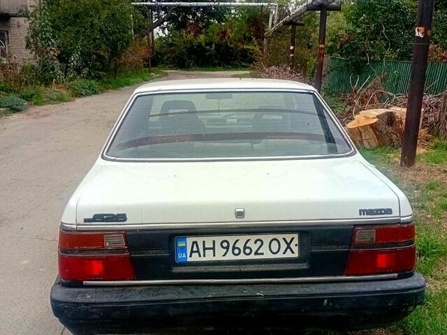 Білий Мазда 626, об'ємом двигуна 2 л та пробігом 300 тис. км за 450 $, фото 2 на Automoto.ua