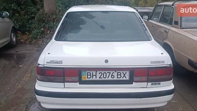 Білий Мазда 626, об'ємом двигуна 2.18 л та пробігом 300 тис. км за 1100 $, фото 4 на Automoto.ua