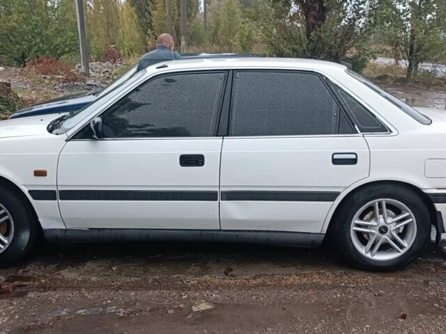 Белый Мазда 626, объемом двигателя 2.18 л и пробегом 300 тыс. км за 1100 $, фото 2 на Automoto.ua