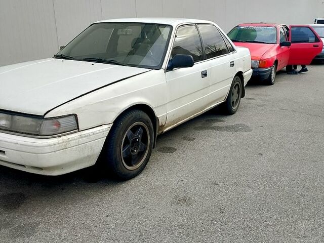 Белый Мазда 626, объемом двигателя 1.8 л и пробегом 0 тыс. км за 1250 $, фото 1 на Automoto.ua