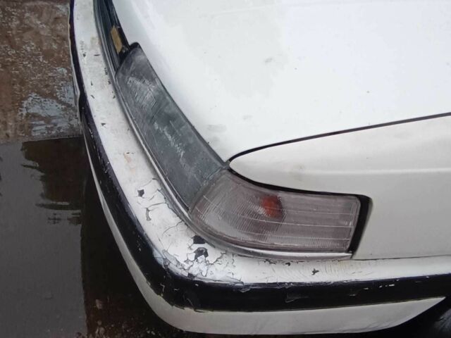 Білий Мазда 626, об'ємом двигуна 2.2 л та пробігом 310 тис. км за 1100 $, фото 1 на Automoto.ua