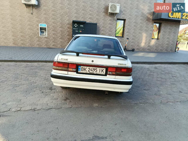 Белый Мазда 626, объемом двигателя 2 л и пробегом 499 тыс. км за 1700 $, фото 5 на Automoto.ua