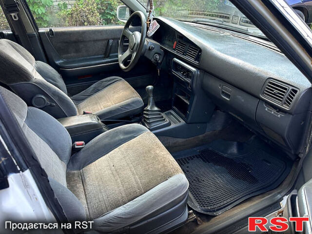 Белый Мазда 626, объемом двигателя 1.8 л и пробегом 310 тыс. км за 700 $, фото 8 на Automoto.ua