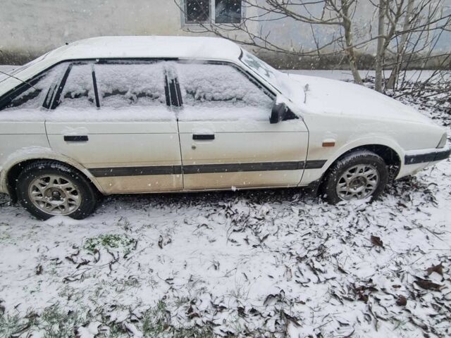 Білий Мазда 626, об'ємом двигуна 0 л та пробігом 235 тис. км за 750 $, фото 1 на Automoto.ua