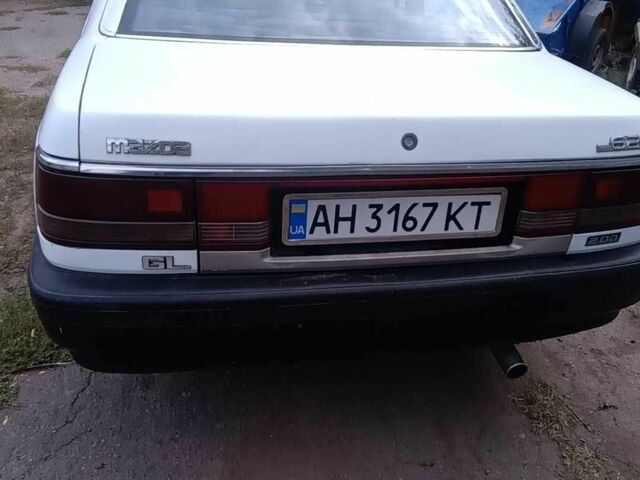 Белый Мазда 626, объемом двигателя 2 л и пробегом 331 тыс. км за 1069 $, фото 3 на Automoto.ua