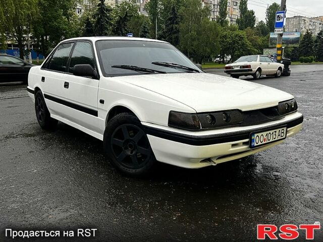 Білий Мазда 626, об'ємом двигуна 2 л та пробігом 222 тис. км за 1600 $, фото 3 на Automoto.ua