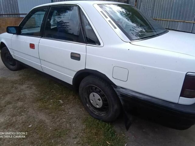 Белый Мазда 626, объемом двигателя 2 л и пробегом 331 тыс. км за 1069 $, фото 4 на Automoto.ua