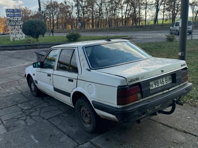 Белый Мазда 626, объемом двигателя 2 л и пробегом 200 тыс. км за 345 $, фото 1 на Automoto.ua