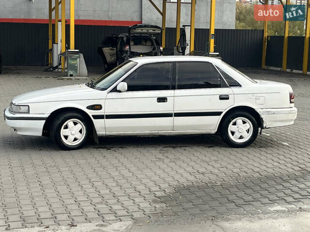 Белый Мазда 626, объемом двигателя 1.98 л и пробегом 300 тыс. км за 1100 $, фото 4 на Automoto.ua