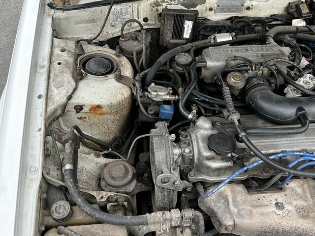 Белый Мазда 626, объемом двигателя 2 л и пробегом 412 тыс. км за 2500 $, фото 1 на Automoto.ua