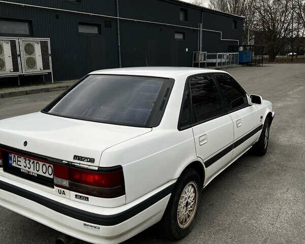 Білий Мазда 626, об'ємом двигуна 2 л та пробігом 412 тис. км за 2500 $, фото 4 на Automoto.ua