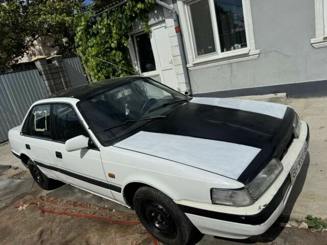 Белый Мазда 626, объемом двигателя 1.8 л и пробегом 333 тыс. км за 730 $, фото 1 на Automoto.ua