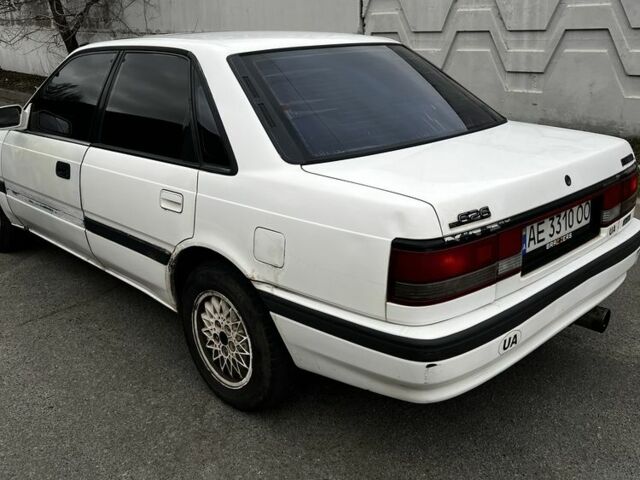 Белый Мазда 626, объемом двигателя 2 л и пробегом 412 тыс. км за 2500 $, фото 6 на Automoto.ua