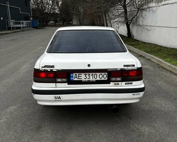 Білий Мазда 626, об'ємом двигуна 2 л та пробігом 412 тис. км за 2500 $, фото 5 на Automoto.ua