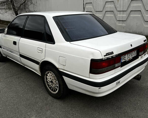 Білий Мазда 626, об'ємом двигуна 2 л та пробігом 412 тис. км за 2500 $, фото 6 на Automoto.ua