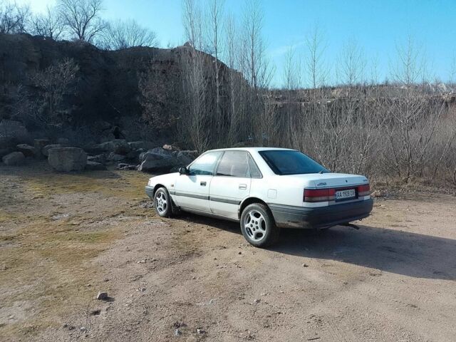 Белый Мазда 626, объемом двигателя 2 л и пробегом 345 тыс. км за 1267 $, фото 4 на Automoto.ua