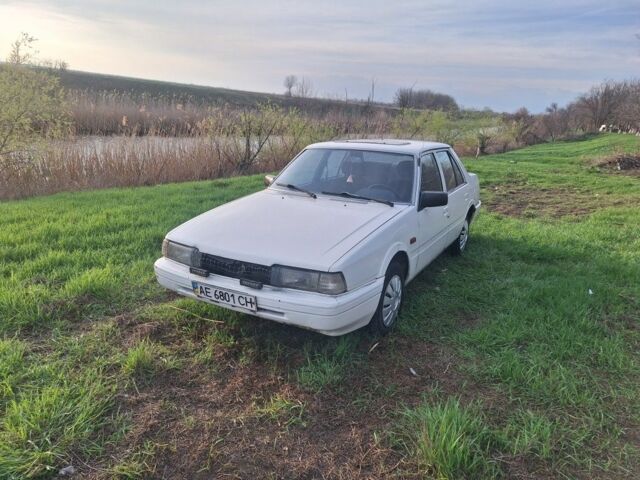 Белый Мазда 626, объемом двигателя 2 л и пробегом 100 тыс. км за 1467 $, фото 4 на Automoto.ua