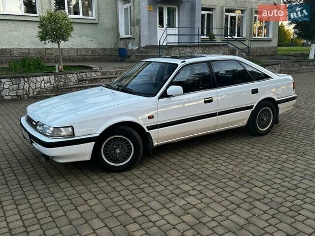 Белый Мазда 626, объемом двигателя 2 л и пробегом 341 тыс. км за 2000 $, фото 5 на Automoto.ua