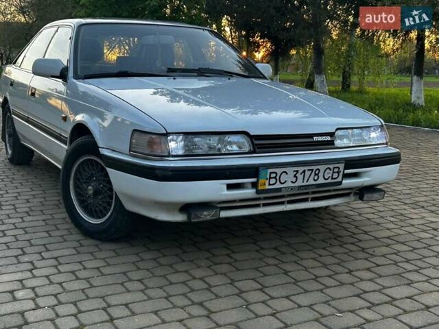 Белый Мазда 626, объемом двигателя 2 л и пробегом 341 тыс. км за 2000 $, фото 2 на Automoto.ua