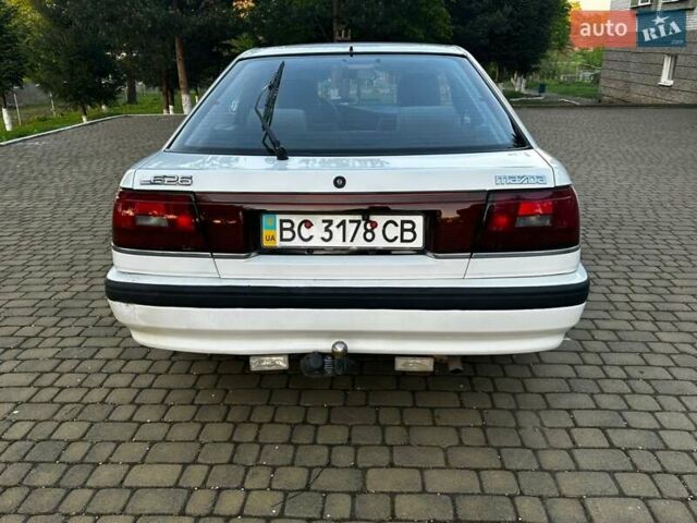 Белый Мазда 626, объемом двигателя 2 л и пробегом 341 тыс. км за 2000 $, фото 15 на Automoto.ua