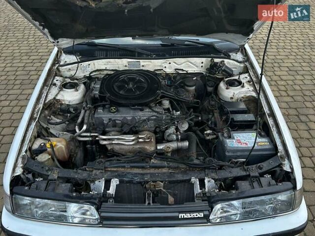 Белый Мазда 626, объемом двигателя 2 л и пробегом 341 тыс. км за 2000 $, фото 11 на Automoto.ua