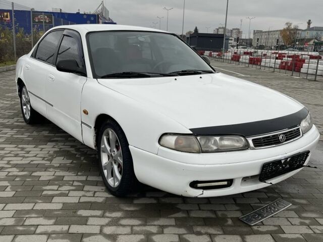 Белый Мазда 626, объемом двигателя 2 л и пробегом 300 тыс. км за 1099 $, фото 4 на Automoto.ua