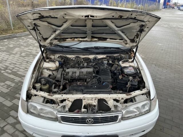 Белый Мазда 626, объемом двигателя 2 л и пробегом 300 тыс. км за 1099 $, фото 5 на Automoto.ua