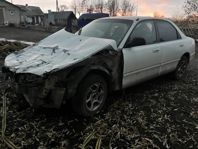 Белый Мазда 626, объемом двигателя 1.8 л и пробегом 300 тыс. км за 1027 $, фото 1 на Automoto.ua