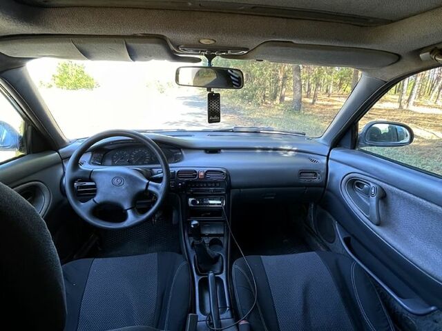 Білий Мазда 626, об'ємом двигуна 1.8 л та пробігом 303 тис. км за 1500 $, фото 6 на Automoto.ua