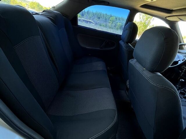 Білий Мазда 626, об'ємом двигуна 1.8 л та пробігом 303 тис. км за 1500 $, фото 8 на Automoto.ua