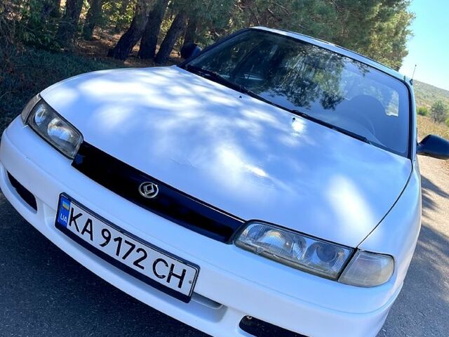 Білий Мазда 626, об'ємом двигуна 1.8 л та пробігом 303 тис. км за 1500 $, фото 1 на Automoto.ua