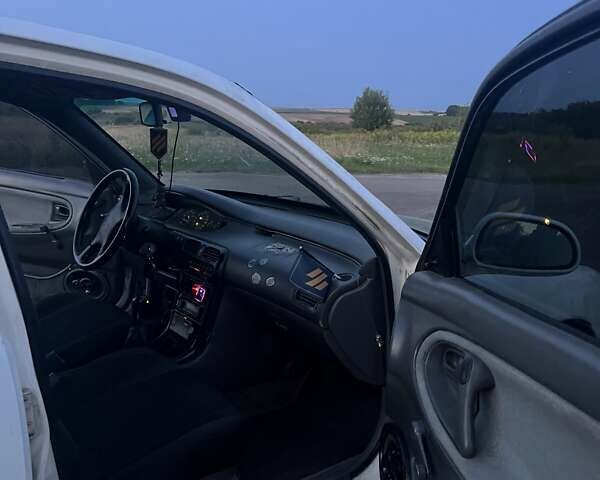 Белый Мазда 626, объемом двигателя 1.84 л и пробегом 400 тыс. км за 1446 $, фото 20 на Automoto.ua