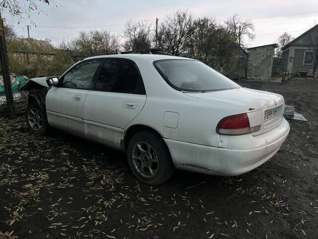 Белый Мазда 626, объемом двигателя 1.8 л и пробегом 300 тыс. км за 1027 $, фото 3 на Automoto.ua