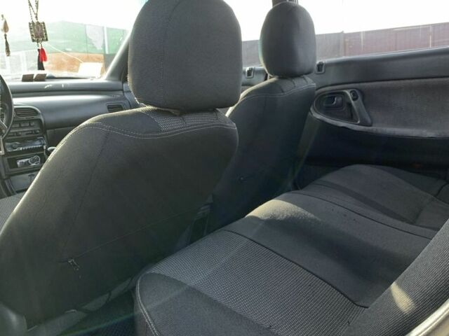 Белый Мазда 626, объемом двигателя 2 л и пробегом 150 тыс. км за 1200 $, фото 5 на Automoto.ua