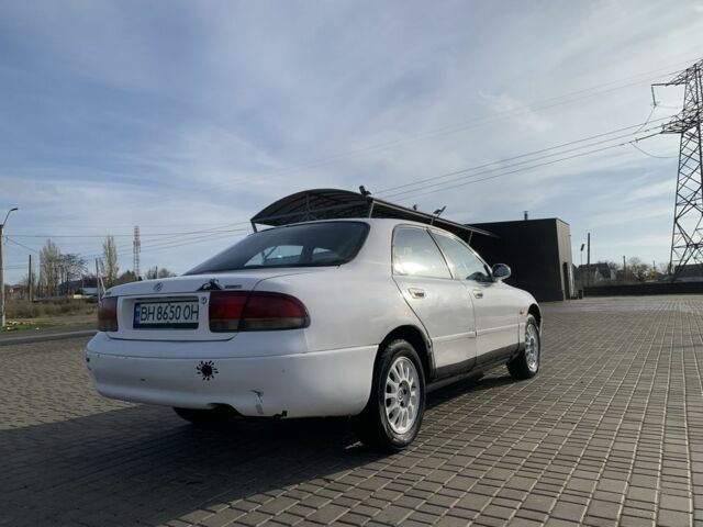 Белый Мазда 626, объемом двигателя 2 л и пробегом 150 тыс. км за 1200 $, фото 3 на Automoto.ua