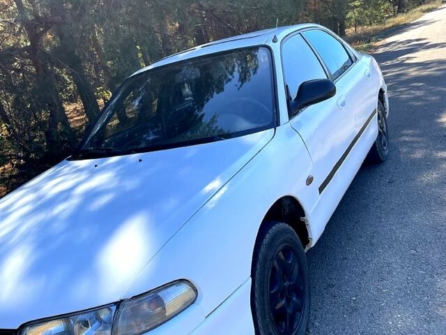 Білий Мазда 626, об'ємом двигуна 1.8 л та пробігом 303 тис. км за 1500 $, фото 2 на Automoto.ua