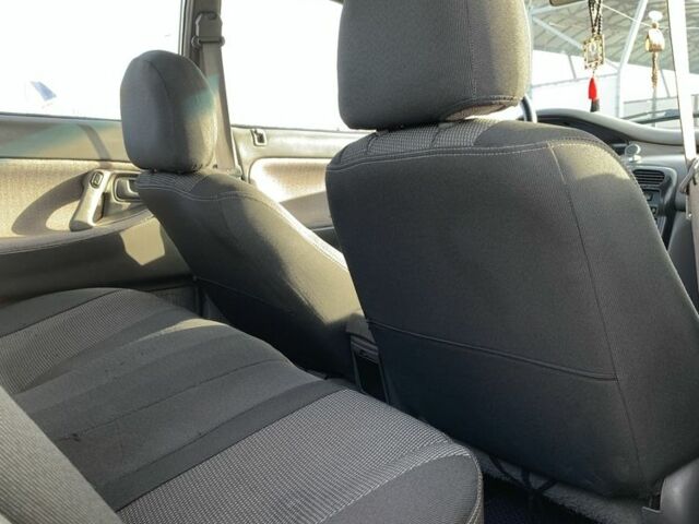 Белый Мазда 626, объемом двигателя 2 л и пробегом 150 тыс. км за 1200 $, фото 6 на Automoto.ua