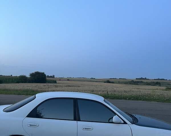 Белый Мазда 626, объемом двигателя 1.84 л и пробегом 400 тыс. км за 1446 $, фото 17 на Automoto.ua