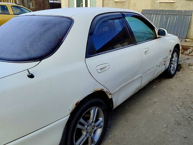 Білий Мазда 626, об'ємом двигуна 2 л та пробігом 400 тис. км за 1750 $, фото 2 на Automoto.ua